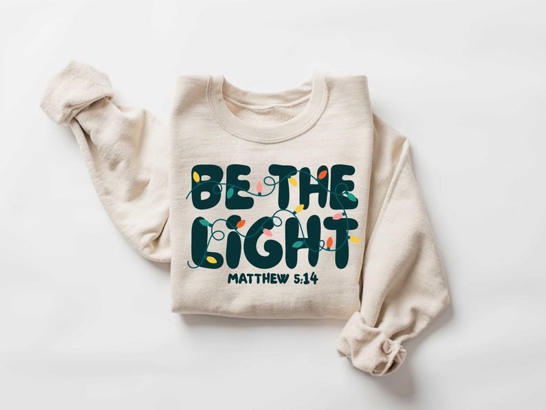Be The Light Sweatshirt, Christmas Religious Shirt for Family, Christmas Lights Sweatshirt, Faith Shirt, Bible Verse Shirt CFNE13