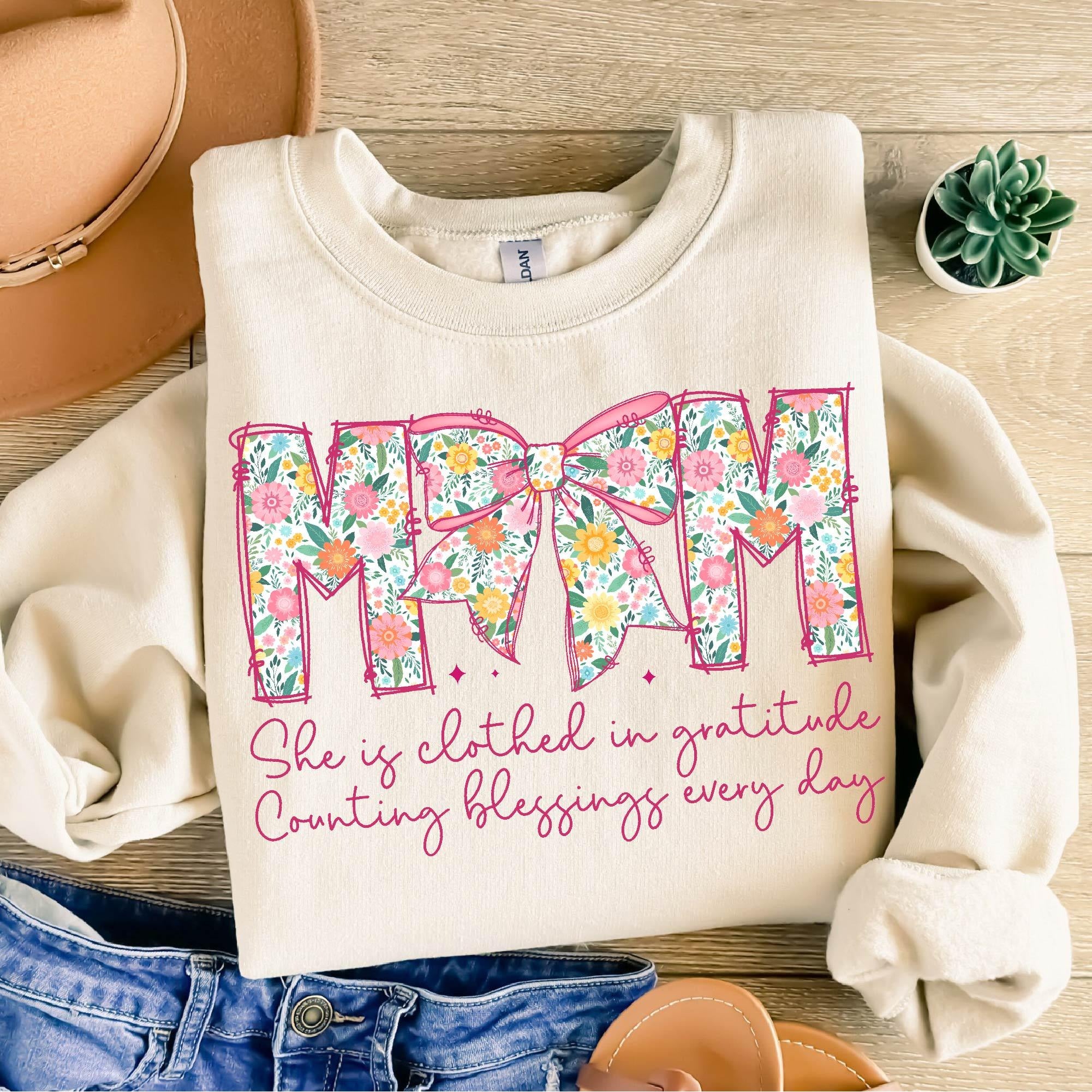 Comfort Colors® Mom, She is Clothed in Gratitude T Shirt, Christian Mama Shirt, Mother Coquette Bow, Retro Mama Shirt, Floral Mom Shirt, Bible Verses Shirt, Gift for Mother's Day