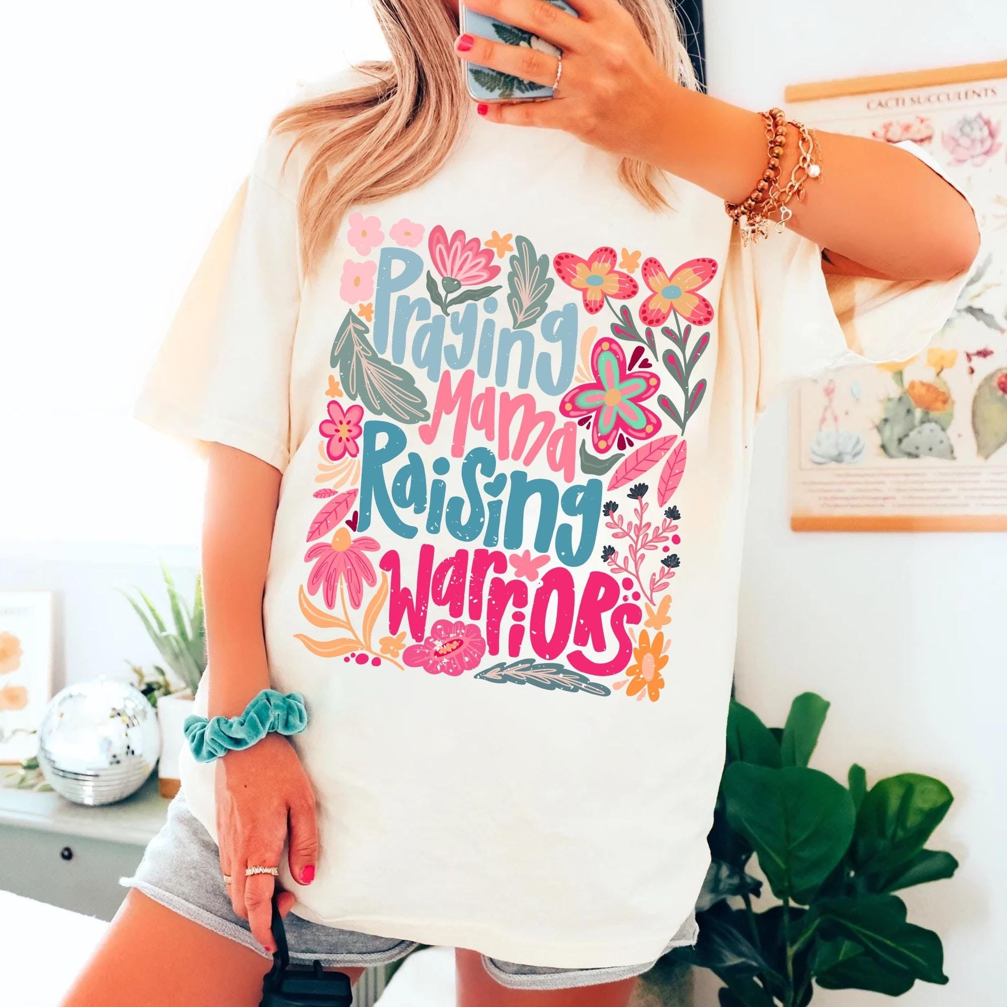 Comfort Colors® Praying Mama Raising Warriors T Shirt, Boho Floral Mama Shirt, Retro Mama Shirt, Wildflower Mama Shirt, Mother’s Day Gift