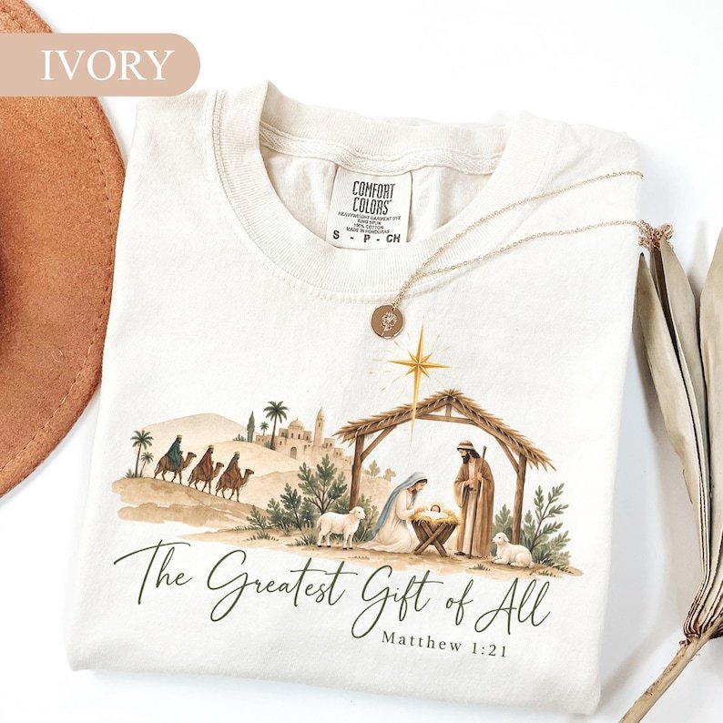 The Greatest Gift of All Shirt, Nativity Scene Christmas Tee, Jesus Birth Shirt, Matthew 1:21 Christian Shirt, Religious Christmas Gift CFNE05