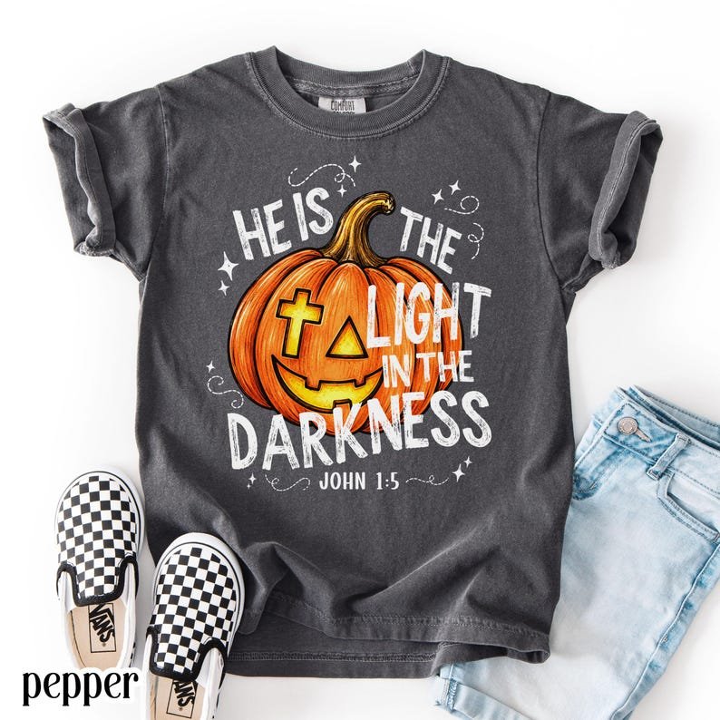 Christian Halloween Comfort Colors Shirt, He Is The Light In The Darkness Tee, Faith Pumpkin Fall Jesus CFNS06