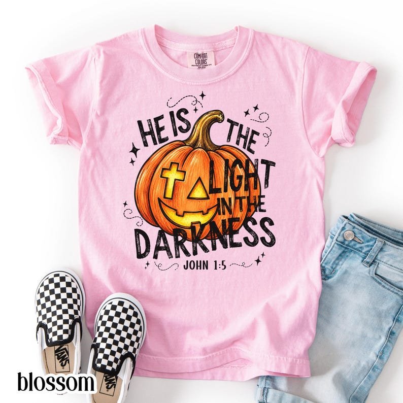 Christian Halloween Comfort Colors Shirt, He Is The Light In The Darkness Tee, Faith Pumpkin Fall Jesus CFNS06