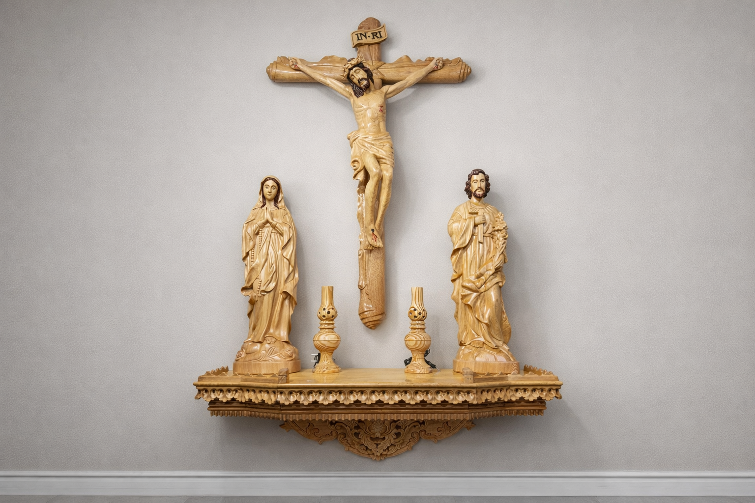 Set of 3 handcrafted wooden religious statues: Jesus on the cross, the Virgin Mary, and Saint Joseph. Catholic art, carved wood, for home or church decoration.
